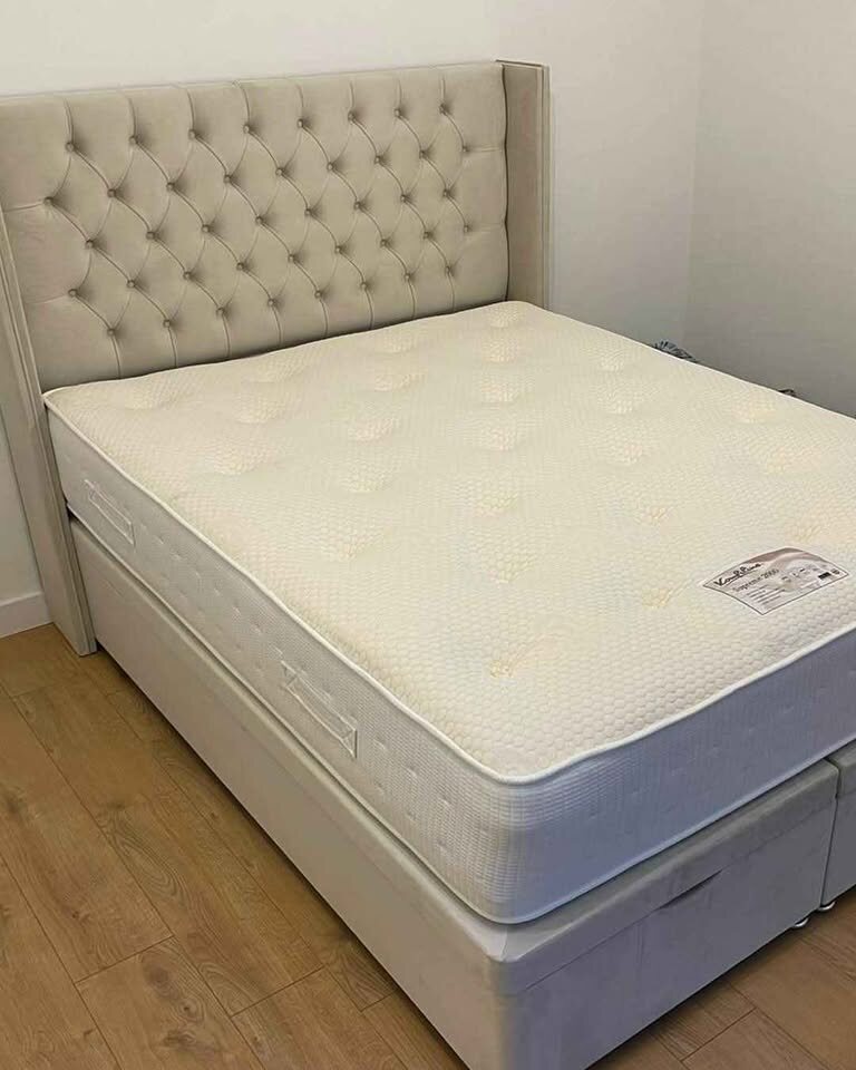 Cream divan with Chesterfield headboard