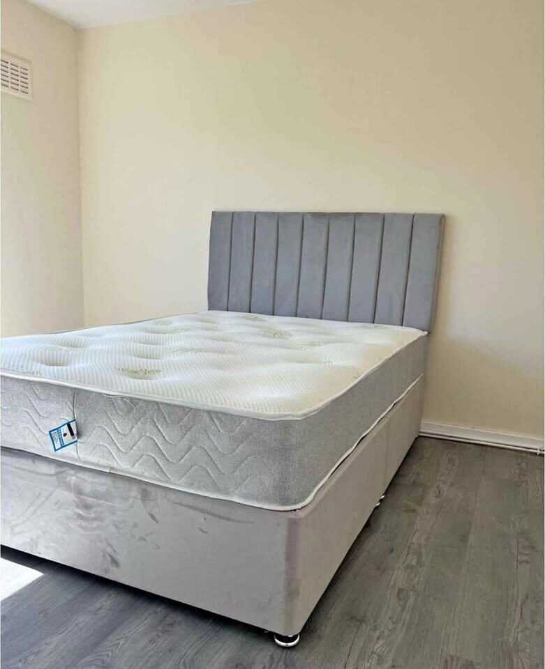 Cream single divan with panel headboard